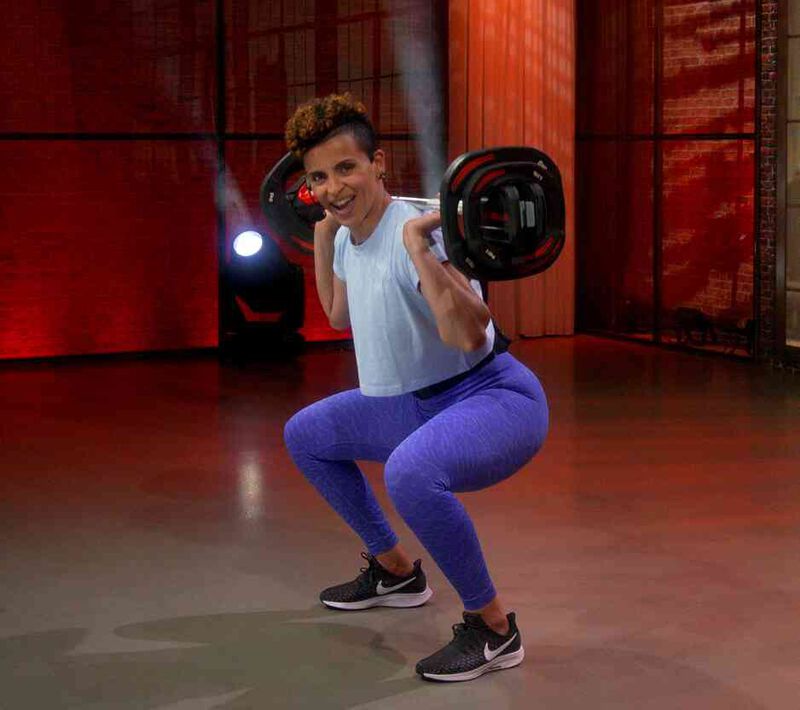Video presenter Yassi working out with a barbell